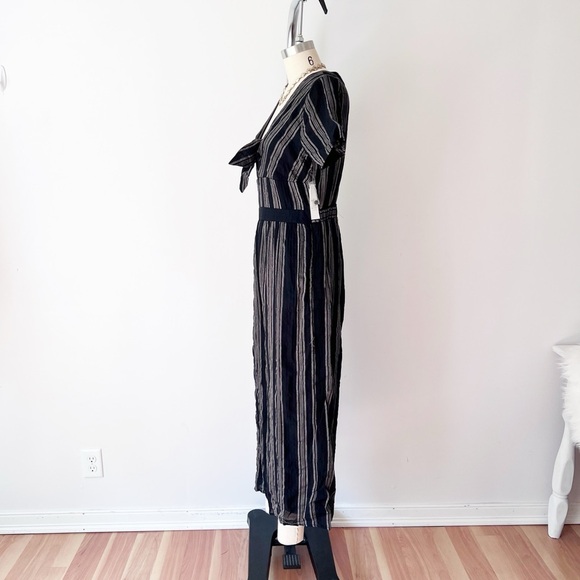 Sadie & Sage Black and Cream Jumpsuit with Peekaboo Detail and Front Tie Striped - Picture 3 of 7